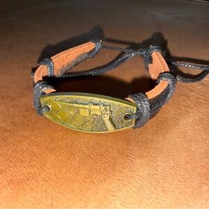 Artisan Black and Gold Leather Bracelet